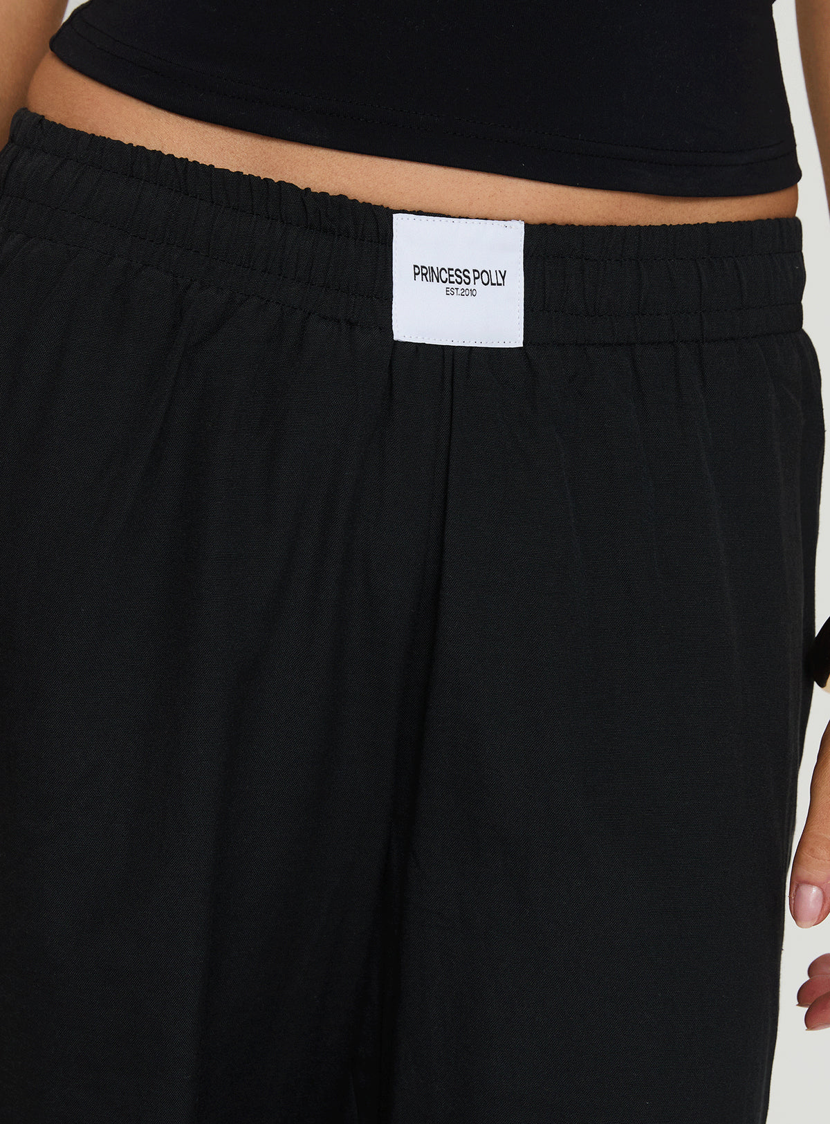 back view of model wearing Princess Polly Beach House Pants Black Low Rise Pants Pants 