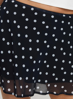 back view of model wearing Princess Polly Dapple Bias Mini Skirt Black Polka Dot Mini Skirts Skirts 