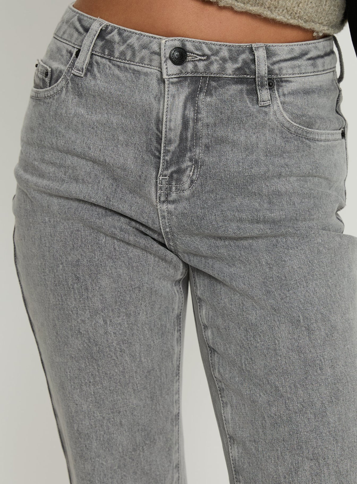 back view of model wearing Princess Polly Magic Mirror Mid Rise Bootleg Jeans Washed Grey Mid Rise Jeans Jeans 