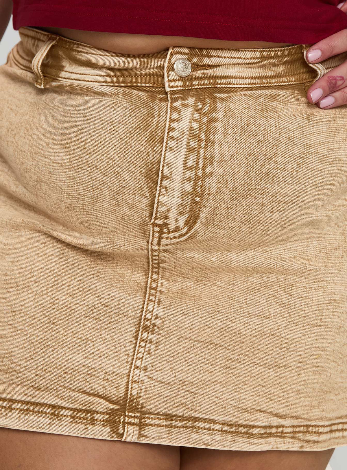 back view of model wearing Princess Polly Velveta Low Rise Denim Skirt Camel Curve Mini Skirts Skirts 