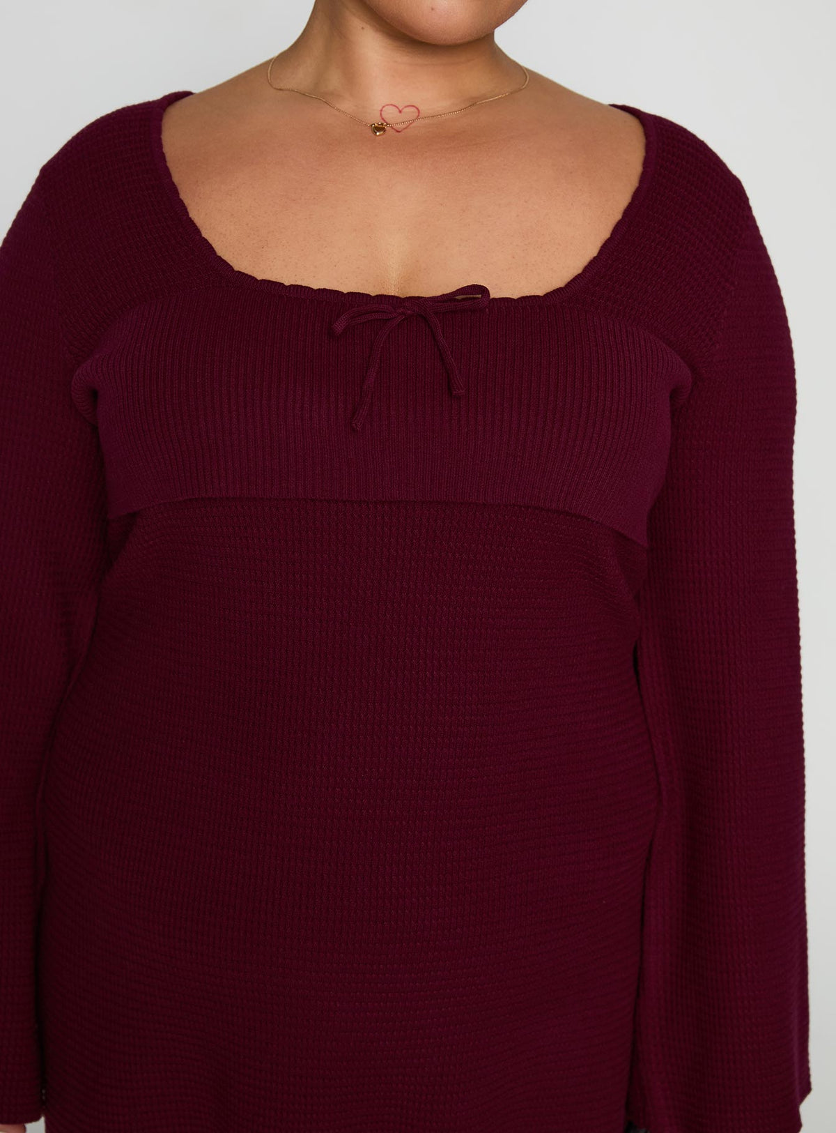 side view of model wearing Princess Polly Sandyra Knit Mini Dress Maroon Curve Square Neck 