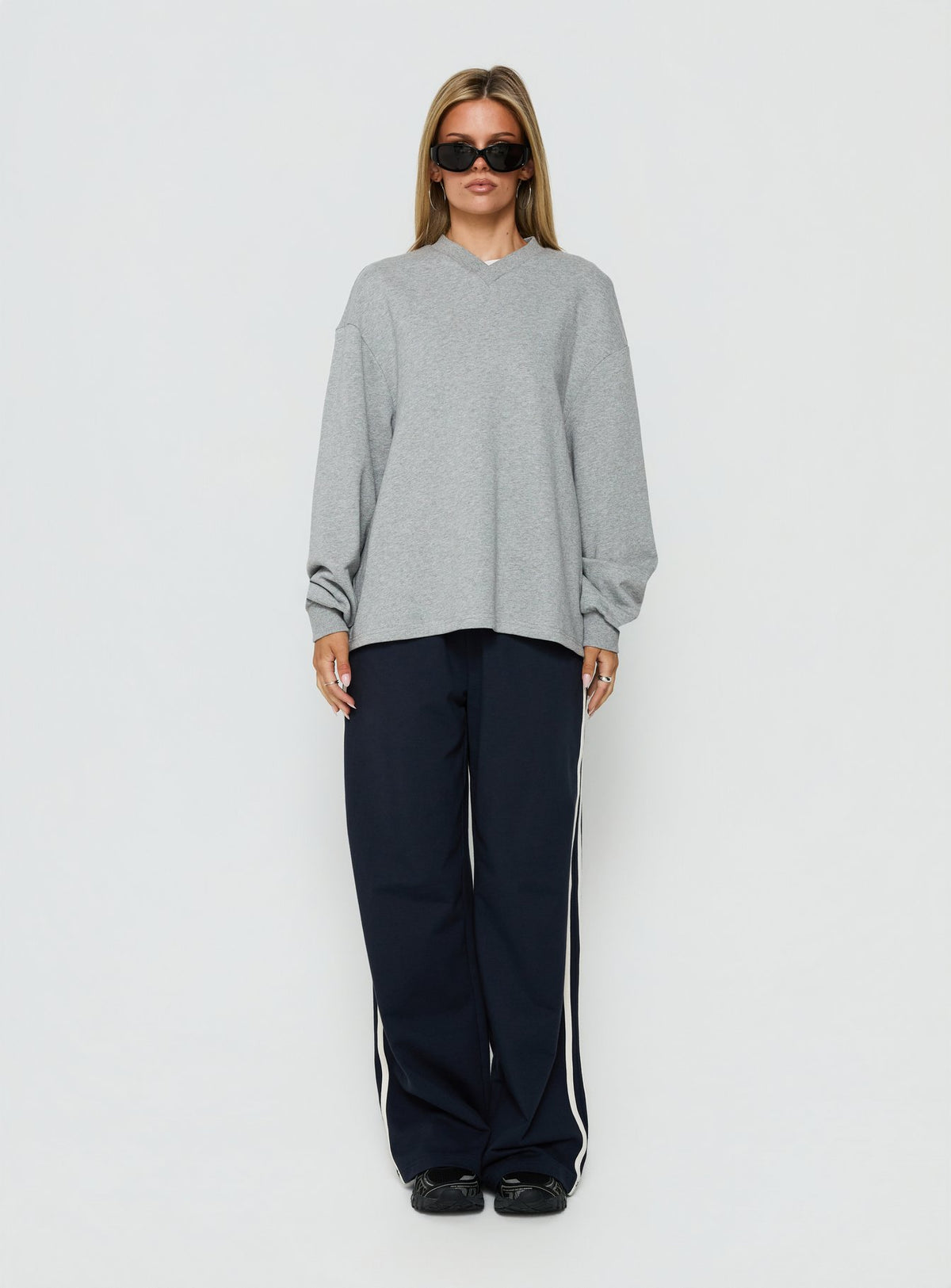 Showcasing the Opollo V Neck Jumper Grey Marle in womens-jumpers with long length and oversized fit front view of model wearing Princess Polly
