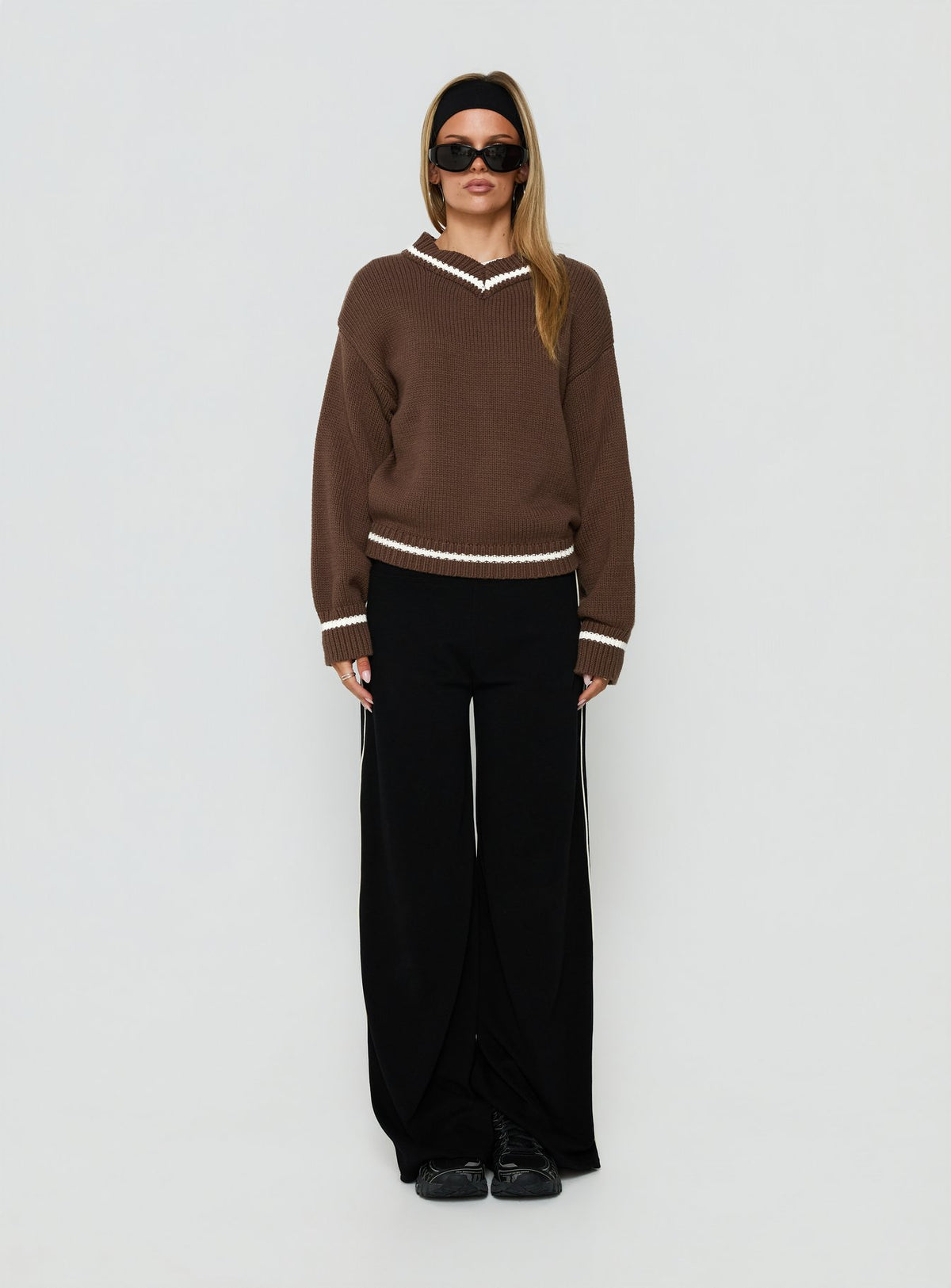 Presenting the Myrandah V Neck Long Sleeve Knit Jumper Chocolate Stripe in womens-jumpers with short length and oversized fit on-body view of model wearing Princess Polly