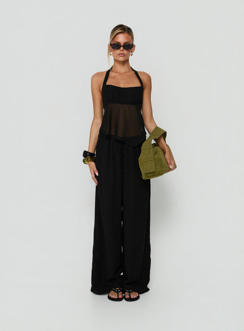 Explore the Finesse Pants Black in womens-regular-pants with mid-rise wide-leg style on-body view of model wearing Princess Polly