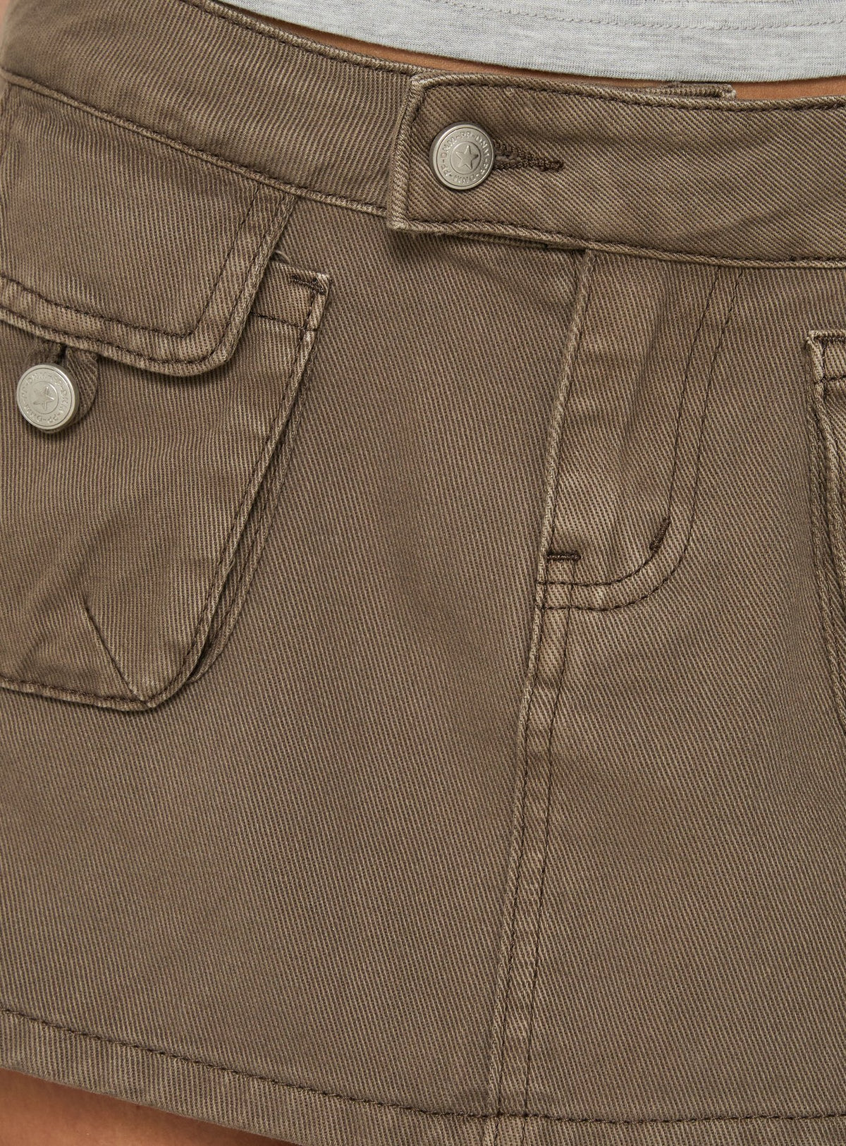 Detailed view of Tarza Cargo Mini Skirt in Khaki womens-skirts with frayed hem Princess Polly