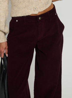 back view of model wearing Princess Polly Jacynda Low Waist Wide Leg Corduroy Jeans Currant Mid Rise Jeans Jeans 