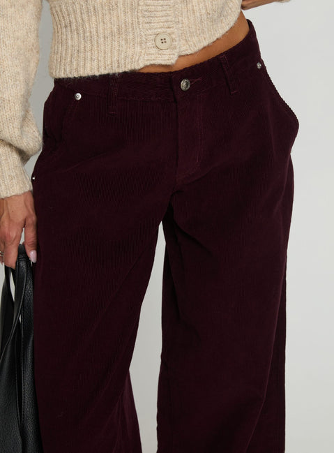 back view of model wearing Princess Polly Jacynda Low Waist Wide Leg Corduroy Jeans Currant Mid Rise Jeans Jeans 