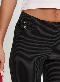back view of model wearing Princess Polly Sympathiser Pinstripe Pants Black Low Rise Pants Pants 