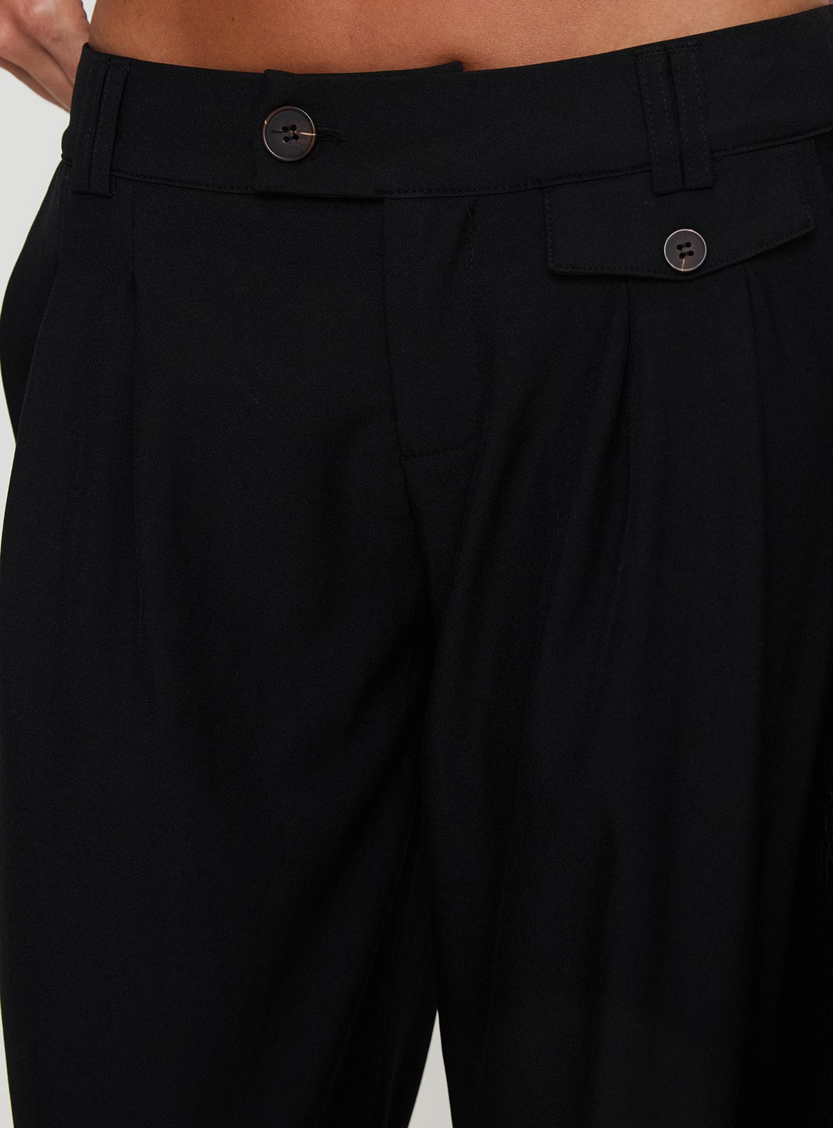 back view of model wearing Princess Polly Sallon Low Rise Pants Black Low Rise Pants Pants 