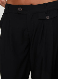 back view of model wearing Princess Polly Sallon Low Rise Pants Black Low Rise Pants Pants 
