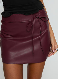 back view of model wearing Princess Polly Moneyshot Faux Leather Mini Skirt Wine Mini Skirts Skirts 