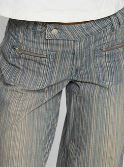 back view of model wearing Princess Polly Lifetimes Mid Rise Wide Leg Cargo Jeans Dark Blue Stripe Mid Rise Jeans Jeans 