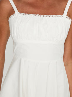 side view of model wearing Princess Polly Poise Mini Dress White Square Neck 