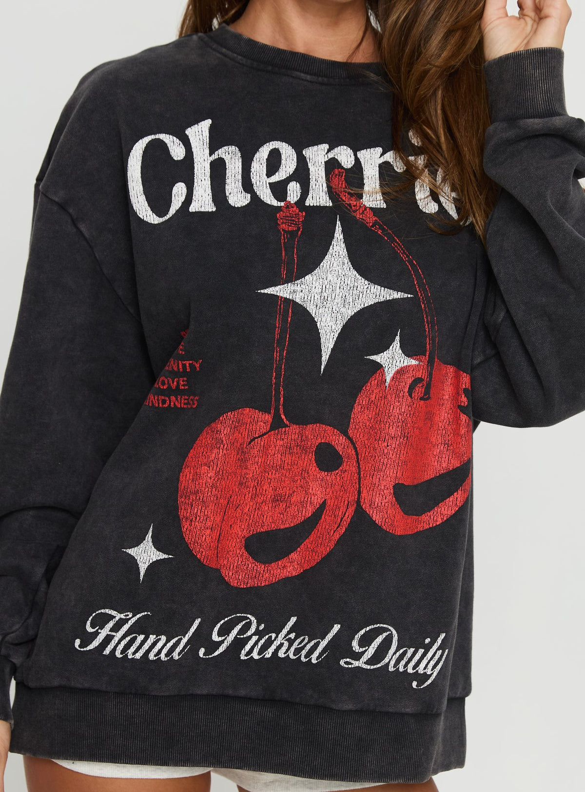 back view of model wearing Princess Polly Hand Picked Graphic Jumper Black Jumpers 