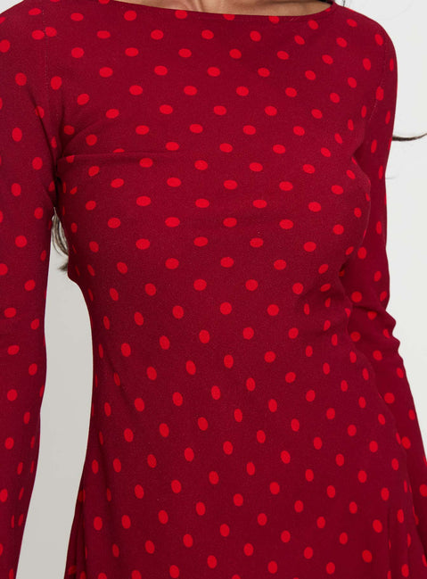 back view of model wearing Princess Polly Good Graces Long Sleeve Mini Dress Red Dot Boat Neck 