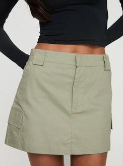   side view of model wearing Princess Polly Gonzales Mini Skirt Olive Mini Skirts Skirts 