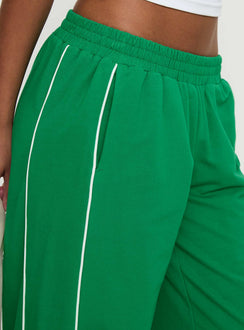 side view of model wearing Princess Polly Field Day Track Pants Green High Rise Pants Pants 