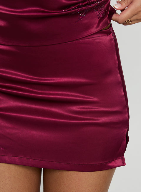 Capturing the rich texture of the Hotstone Mini Skort Berry in womens-skirts with mini length Princess Polly
