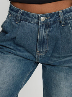 back view of model wearing Princess Polly Laguardia Mid Rise Wide Leg Jeans Dark Blue Wash Mid Rise Jeans Jeans 