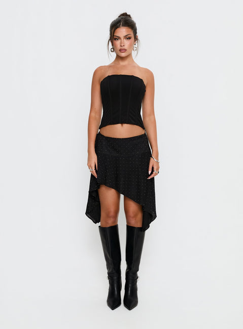   side view of model wearing Princess Polly Hevenna Asymmetrical Plisse Mini Skirt Black Diamante Mini Skirts Skirts 