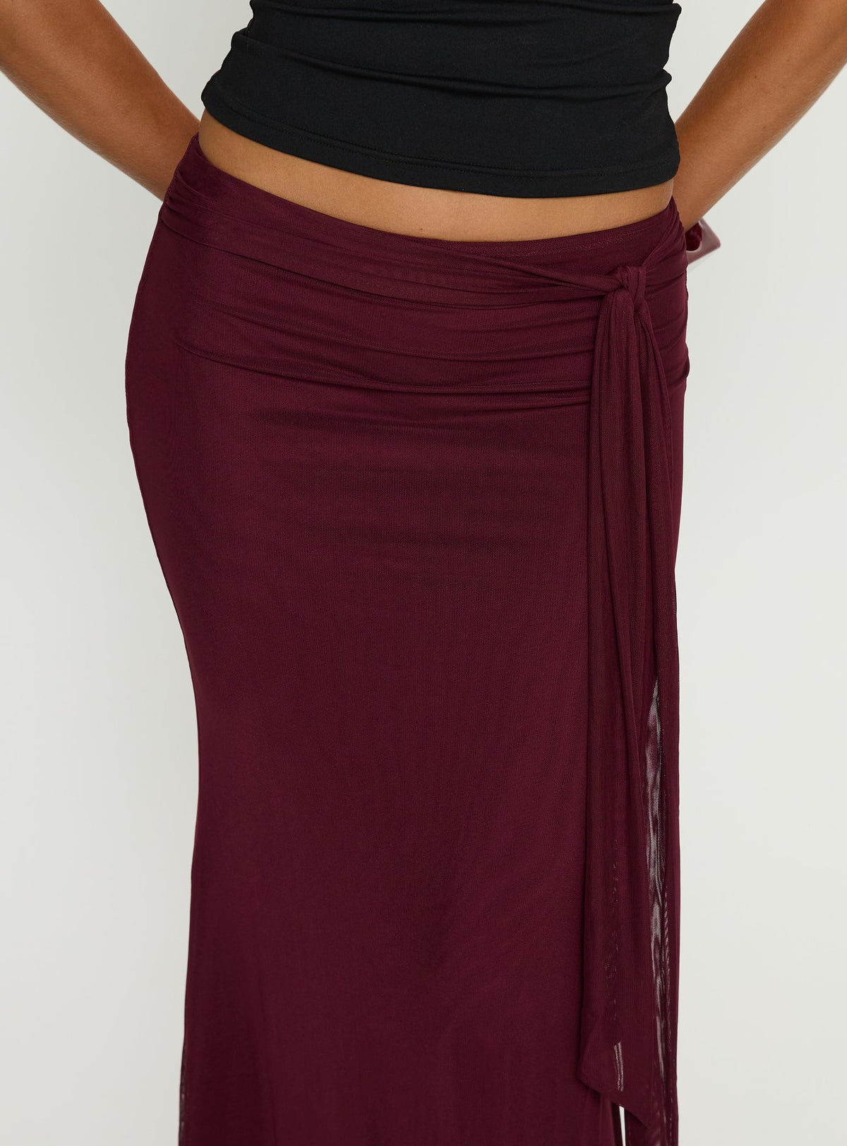 back view of model wearing Princess Polly Caviar Tie Maxi Skirt Currant Maxi Skirts Skirts 
