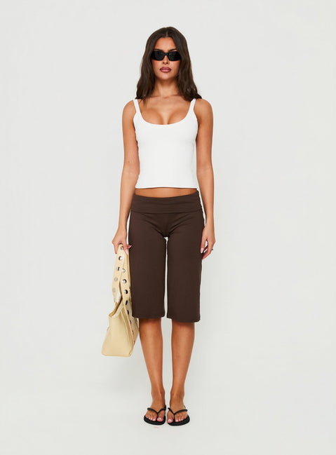 Showcasing the Laroy Folded Capri Pant Chocolate in womens regular pants with high-rise waist front view of model wearing
