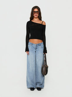Designed with Picco Ultra Low Rise Wide Leg Jeans Light Blue Wash Petite in womens-jeans showcasing low-rise waist and belt Princess Polly