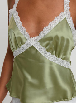 back view of model wearing Princess Polly Bimbette Halter Cami Top Green Sleeveless Plunger 