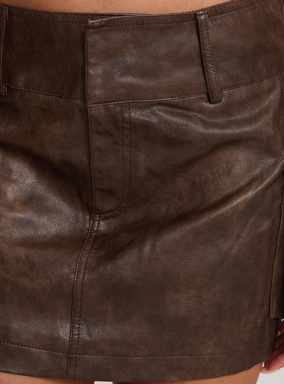 back view of model wearing Princess Polly Domenic Faux Leather Mini Skirt Washed Brown Mini Skirts Skirts 