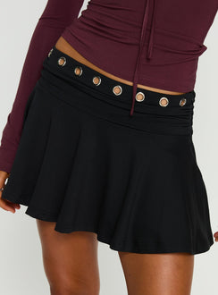back view of model wearing Princess Polly Amryn Eyelet Mini Skirt Black Mini Skirts Skirts 