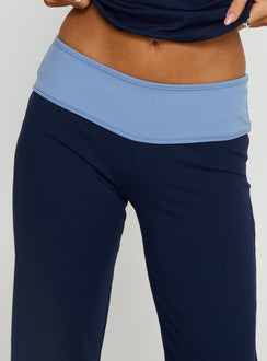 back view of model wearing Princess Polly Kobee Jersey Flare Pants Navy / Light Blue High Rise Pants Pants 