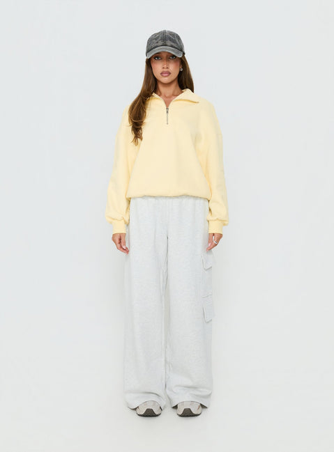side view of model wearing Princess Polly Rozanna 1/4 Zip Jumper Butter Cropped Jumpers Jumpers 