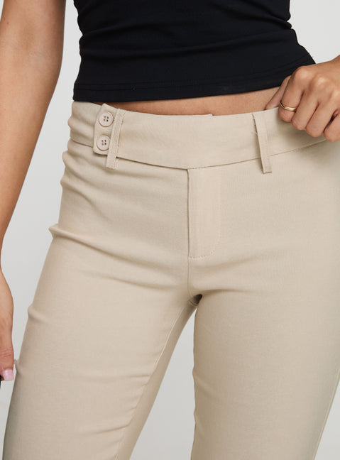 back view of model wearing Princess Polly Kinkirk Flared Pants Taupe Petite Pants 