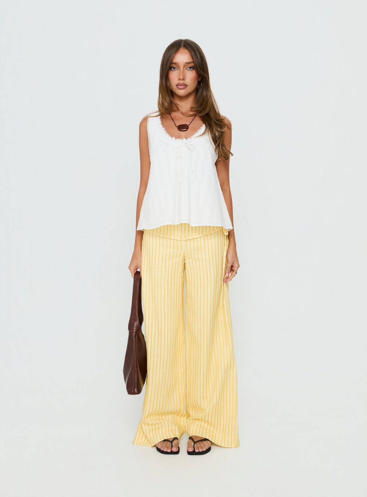 front view of model wearing Princess Polly Silver Moon Pants Yellow Stripe Low Rise Pants Pants 