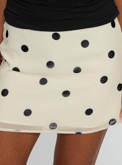  front view of model wearing Princess Polly Adelaida Ruffle Mini Skirt Cream Polka Dot Mini Skirts Skirts 