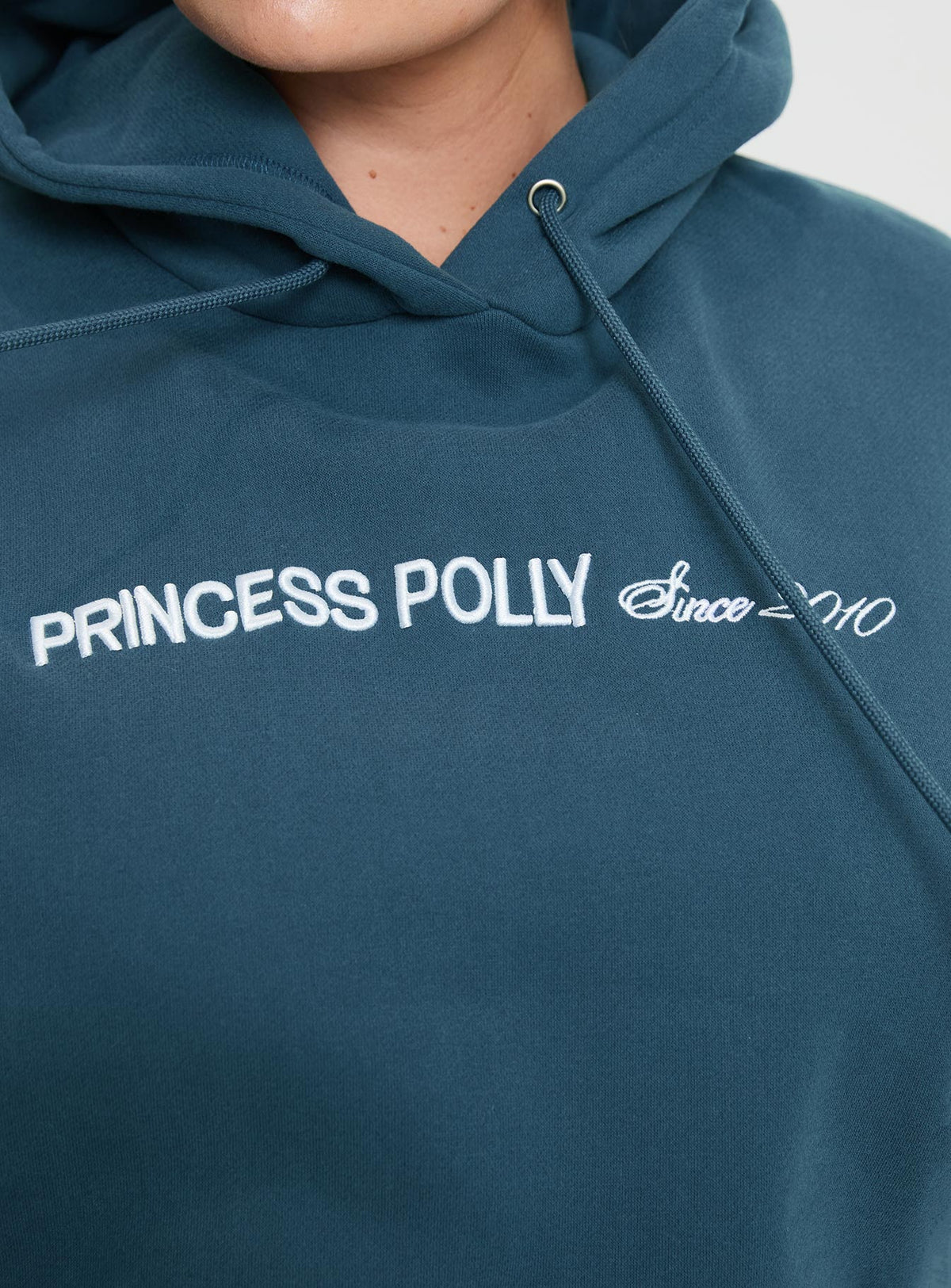 back view of model wearing Princess Polly Princess Polly Hooded Sweatshirt Block / Cursive Text Slate Curve Jumpers 