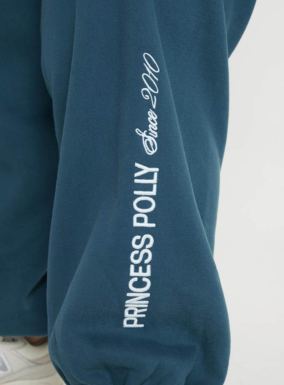 front view of model wearing Princess Polly Princess Polly Track Pants Block / Cursive Text Slate Curve Pants 