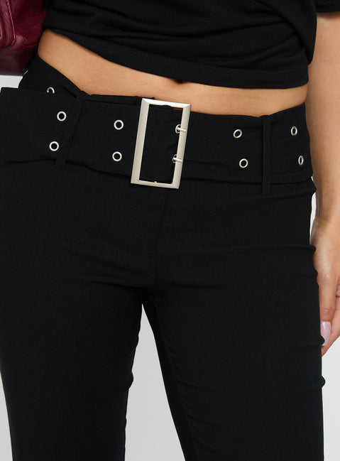 back view of model wearing Princess Polly Kortnee Eyelet Detail Flare Leg Pants Black Low Rise Pants Pants 