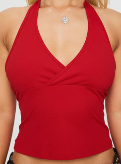 back view of model wearing Princess Polly Stand By Halter Top Red Sleeveless Plunger 