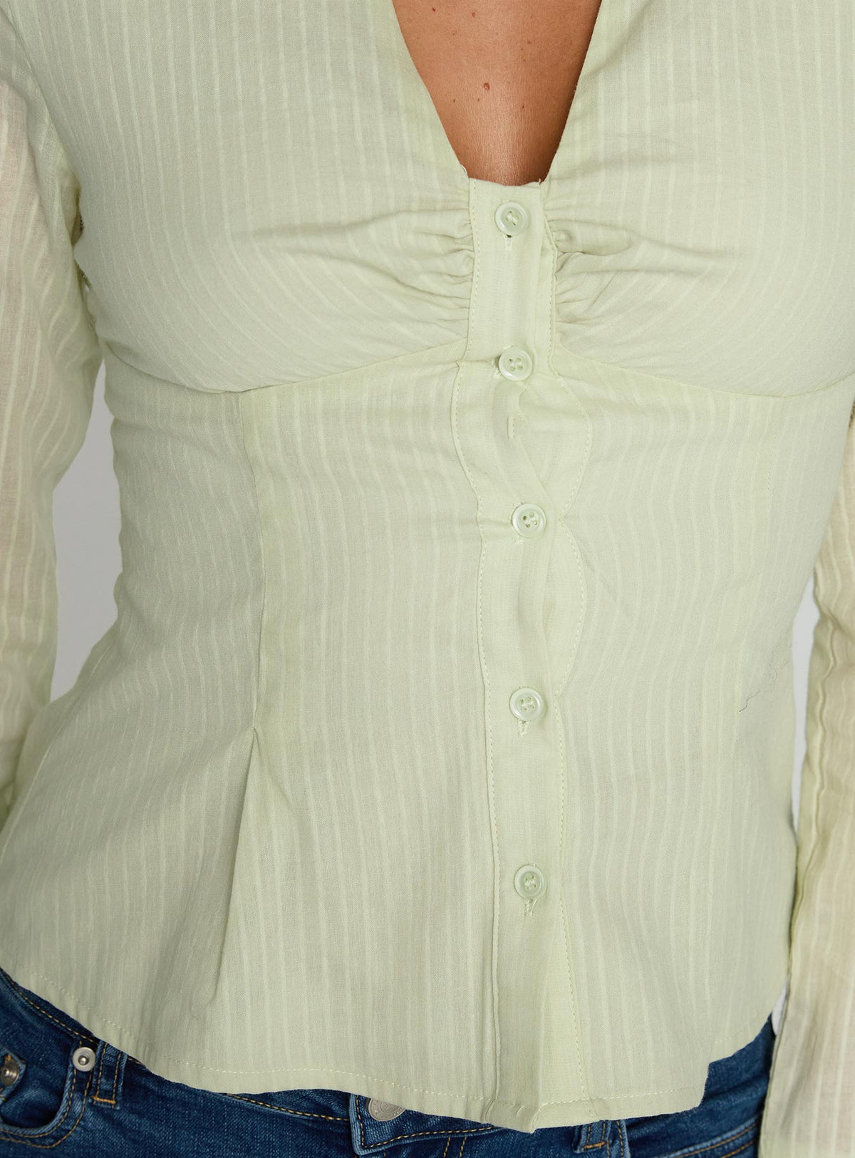 back view of model wearing Princess Polly Elowenn Long Sleeve Top Green Full Sleeves V-Neck 