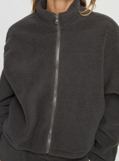 back view of model wearing Princess Polly Siberia Fleece Zip Up Jumper Charcoal regular Jumpers 