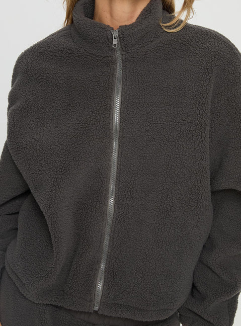 back view of model wearing Princess Polly Siberia Fleece Zip Up Jumper Charcoal regular Jumpers 