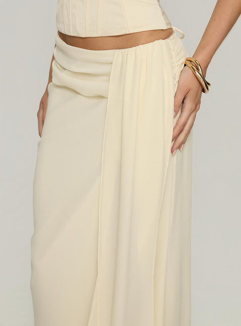 back view of model wearing Princess Polly Holliann Draped Maxi Skirt Butter Maxi Skirts Skirts 
