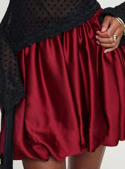 back view of model wearing Princess Polly Rubee Bubble Hem Mini Skirt Red Mini Skirts Skirts 