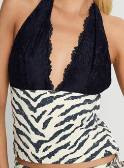 back view of model wearing Princess Polly Guilty Pleasure Top Zebra Sleeveless Plunger 