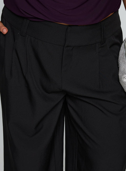 side view of model wearing Princess Polly Two Lovers Low Rise Pants Black Curve Low Rise Pants Pants 