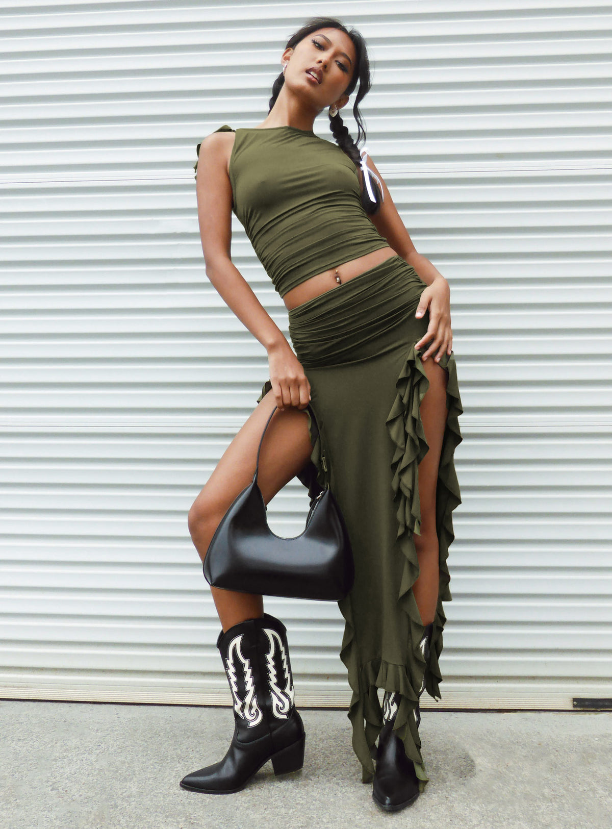 Front view of model wearing  front Princess Polly Sleeveless Crew Neck  Rendezvous Top Olive