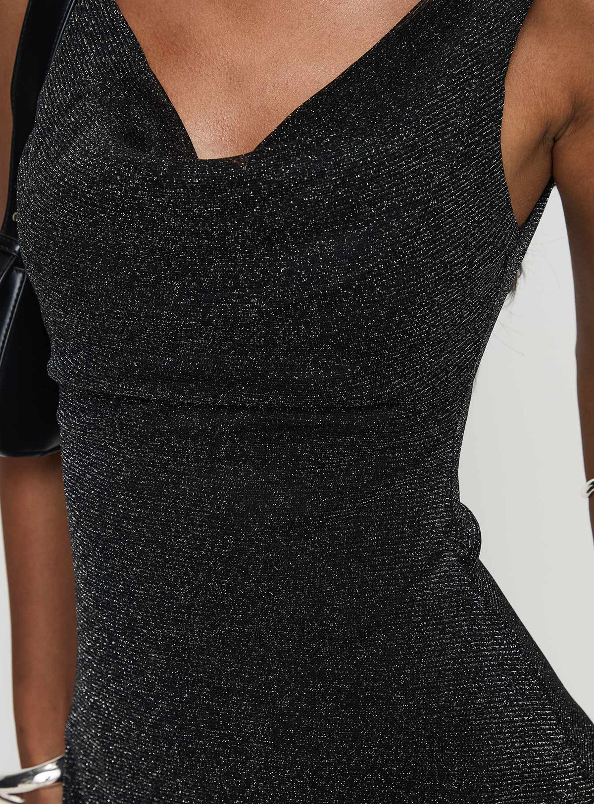 back view of model wearing Princess Polly Romani Mini Dress Black Glitter Cowl Neck 