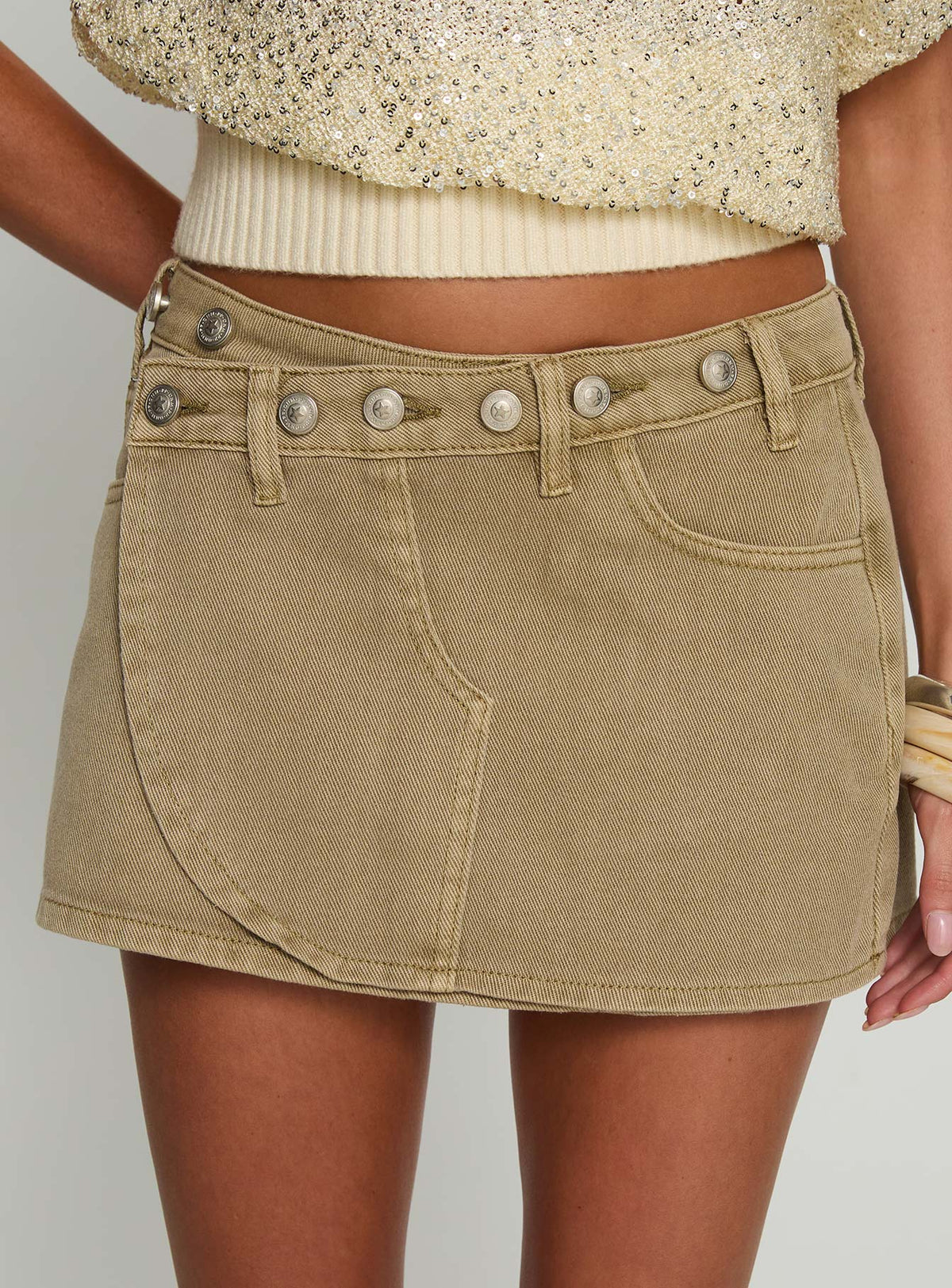back view of model wearing Princess Polly Katlynne Button Detail Mini Skirt Washed Beige Mini Skirts Skirts 