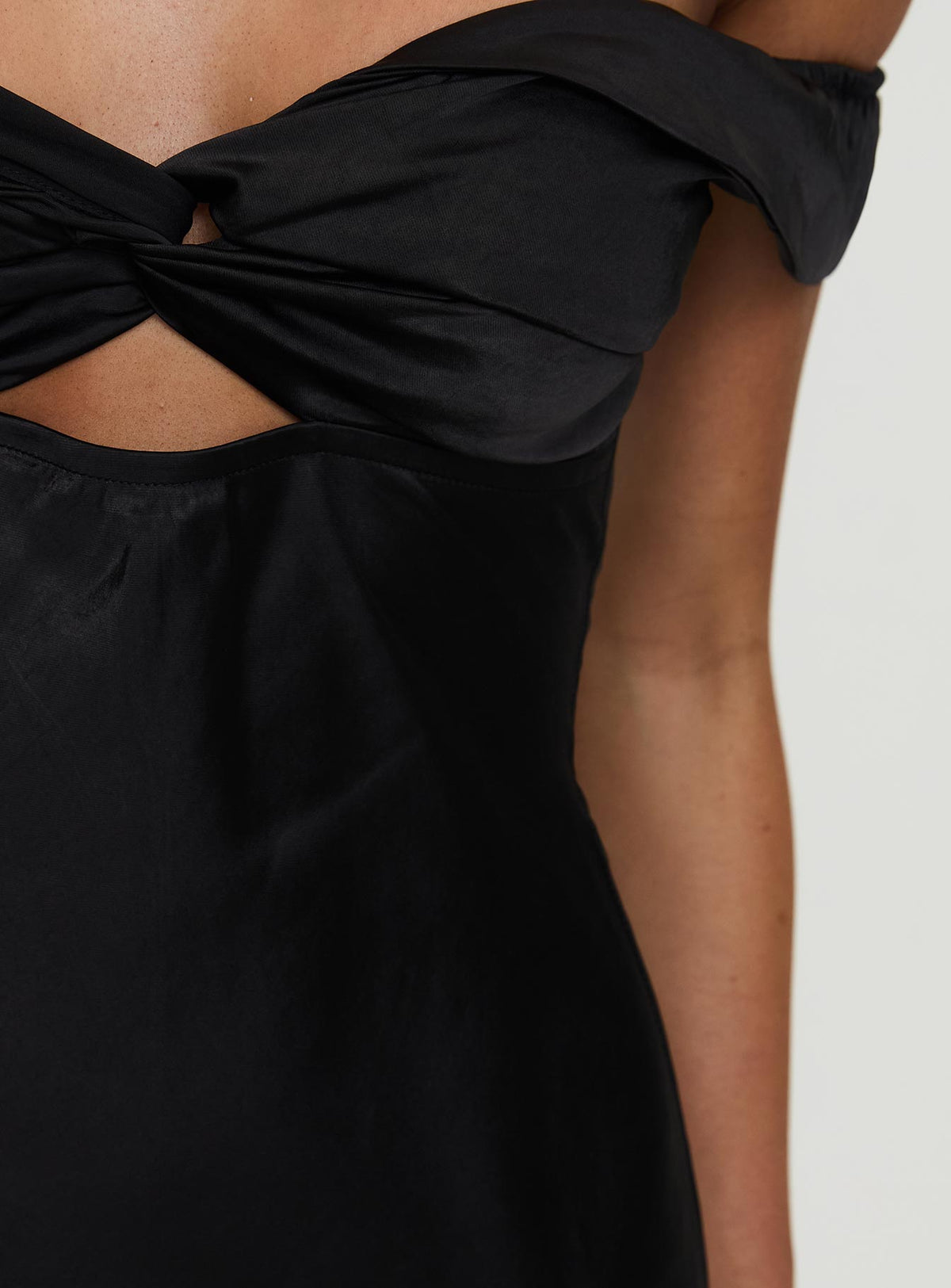 side view of model wearing Princess Polly Rava Off The Shoulder Maxi Dress Black Sweetheart Neckline 